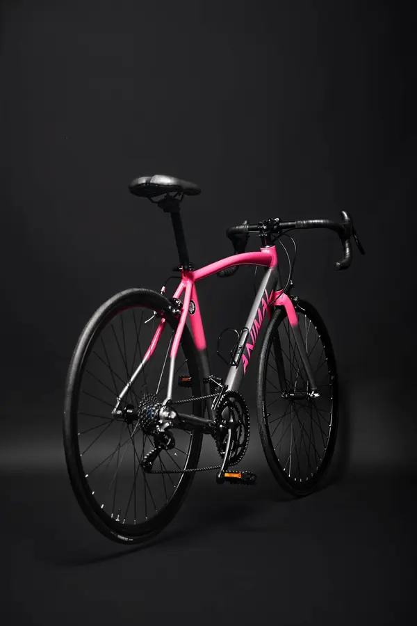 Bicicleta de ruta Animal negra y rosa